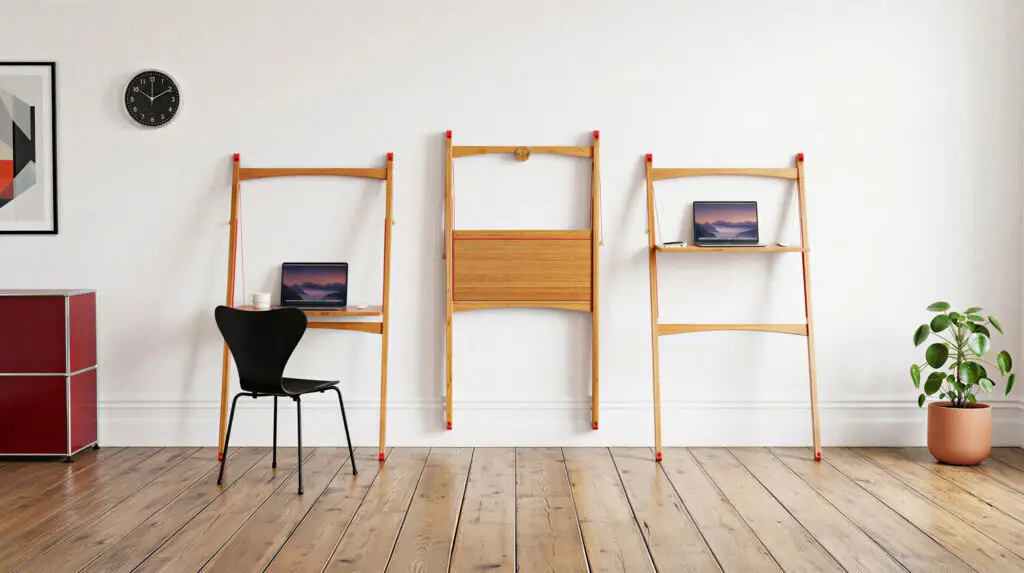 Leandesk in seated, stored, and standing positions in the studio